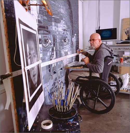 Chick Close busy at work in his studio: https://s-media-cache-ak0.pinimg.com/originals/b8/38/22/b8382226b5e49669453989e41e984831.jpg