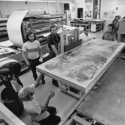 Robert Rauschenberg working with his printmakers on prints: http://nga.gov.au/InternationalPrints/Tyler/IMAGES/SUPS/166510.jpg