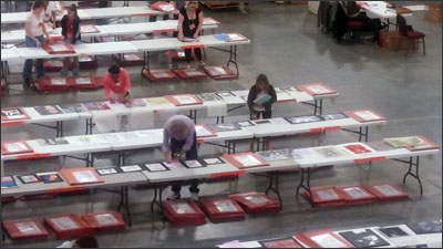 AP Readers READING your AP Tests. http://blogs.edweek.org/edweek/curriculum/assets_c/2013/06/APArt2_400%20(2)-thumb-420x236-5362.jpg